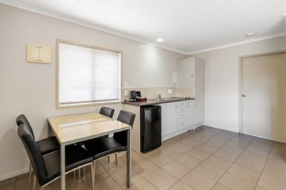 One-Bedroom Unit - dining table and kitchenette